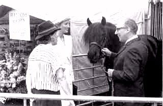 H.R.H. The Princess of Wales talking to Jim Wykes and Sheila Hardy when she visited the Fell Pony Society stand at the Royal Show [select to view a larger image]